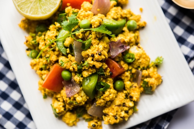 Premium Photo | Paneer bhurji, mildly spiced cottage cheese scramble ...