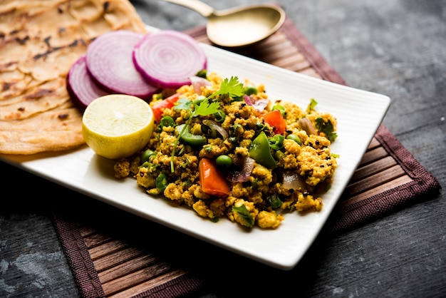 Premium Photo | Paneer bhurji, mildly spiced cottage cheese scramble ...