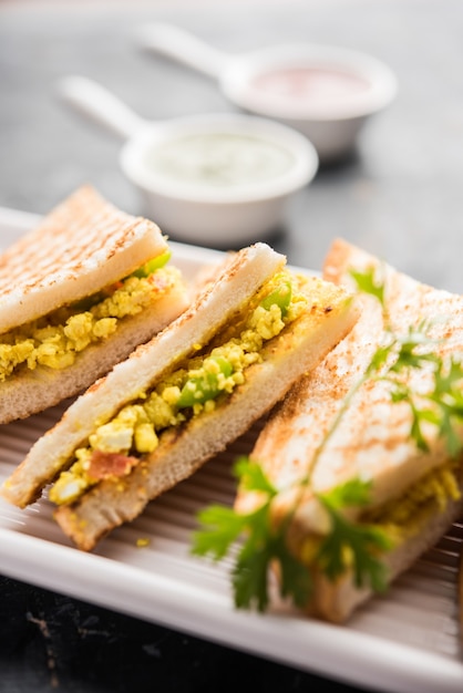 Premium Photo | Paneer bhurji sandwich is a tasty paneer based dish ...