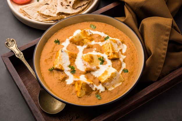 Premium Photo | Paneer butter masala or cheese cottage curry