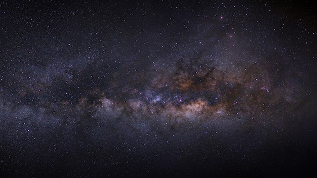 Panorama milky way galaxy on a night sky, long exposure photograph, with grain. Premium Photo