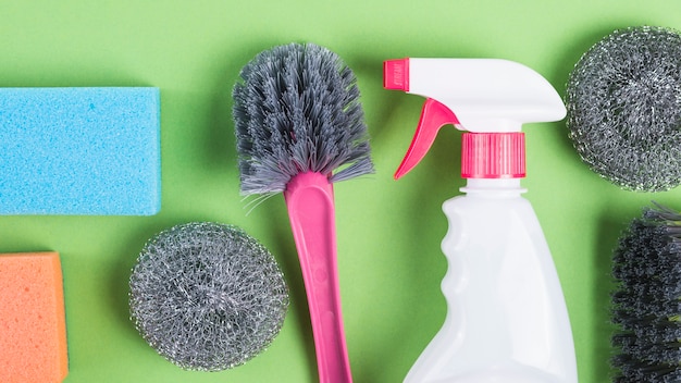 Free Photo | Panoramic view of cleaning equipments on green background