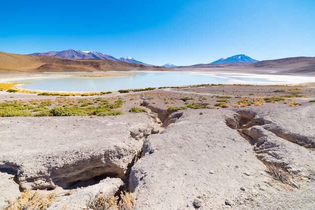 Panoramic view of frozen salty lake on the way to the famous uyuni salt flat Premium Photo