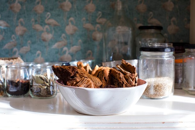 Premium Photo Pantry Of Leaves Wood And Dried Flowers In Glass Jars