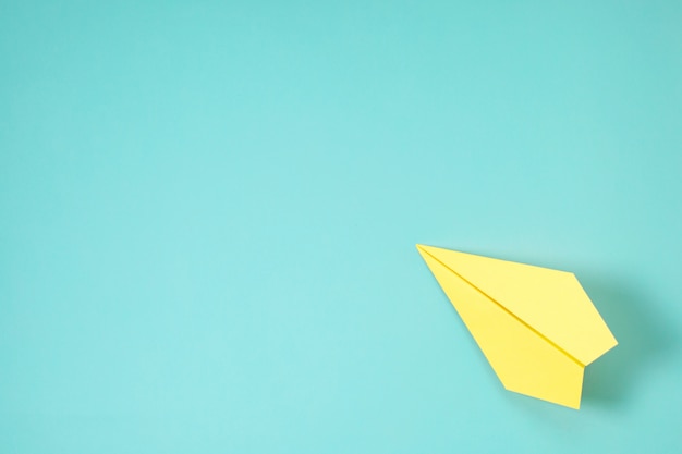 Premium Photo | Paper plane on blue background