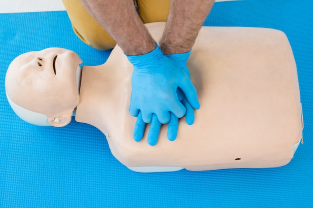 Download Free Paramedic Practising Cardiopulmonary Resuscitation On Dummy Use our free logo maker to create a logo and build your brand. Put your logo on business cards, promotional products, or your website for brand visibility.