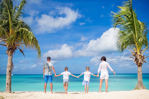 Premium Photo | Parents with two kids enjoy their caribbean vacation on ...