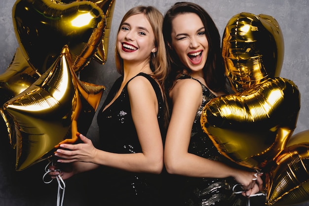 Premium Photo | Party fun. beautiful girls celebrating new year ...