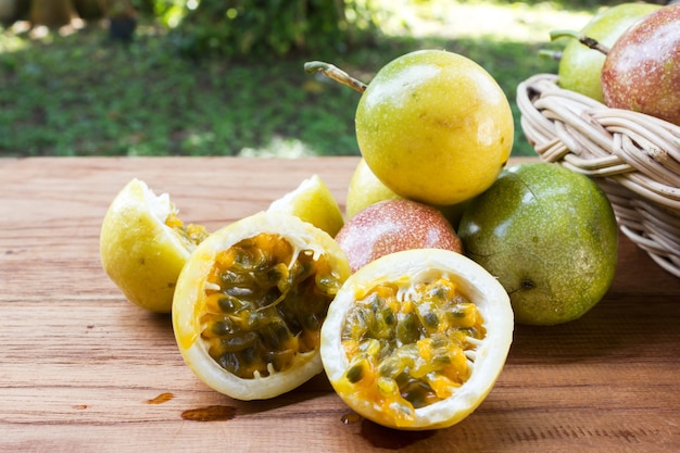 Passion Fruit On Wooden Background Photo Premium Download