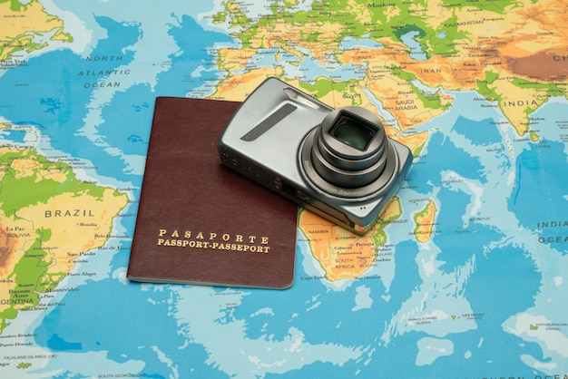 Premium Photo Passport World Map Camera Travel Concept