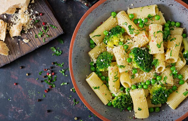 Premium Photo | Pasta rigatoni with broccoli and green peas. vegan menu ...