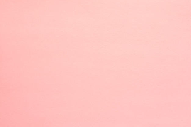 パステルピンク色の壁の背景 プレミアム写真