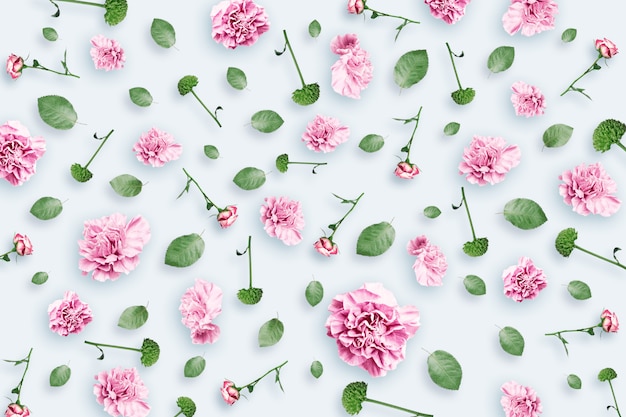Pattern Of Pink And Beige Roses And Green Leaves On A White Background