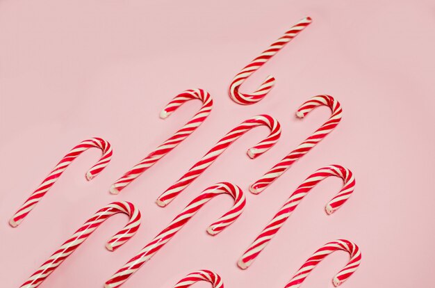 Premium Photo | Pattern of striped candies in christmas colors on baby ...