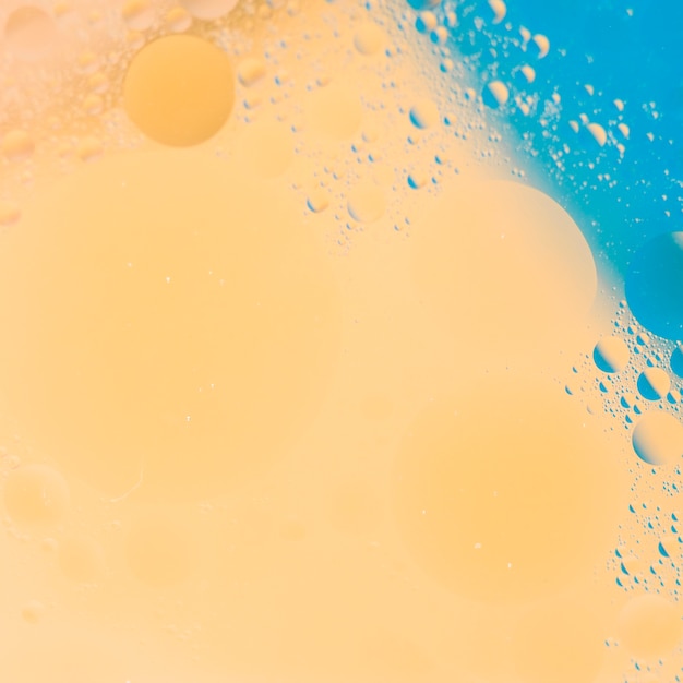 Free Photo | Peach and blue paint background with bubble textured