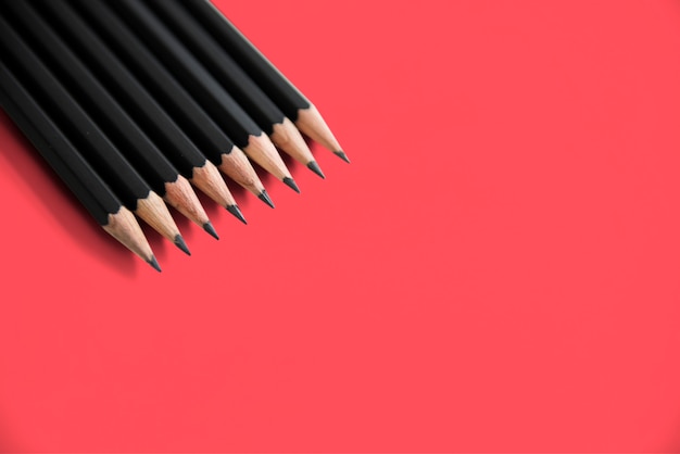 Premium Photo | Pencils lined up layer isolated background