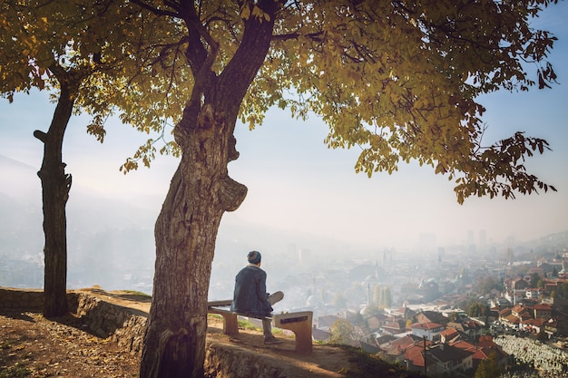 Premium Photo | People in beautiful park with city view