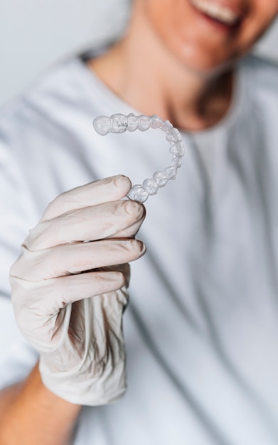 Premium Photo | People in a dental lab working in the fabrication ...