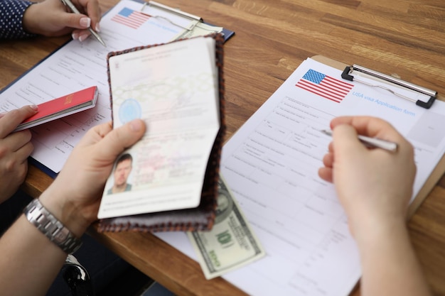 Premium Photo People Filling Visa Application Forms With Personal premium-photo-people-filling-visa-application-forms-with-personal