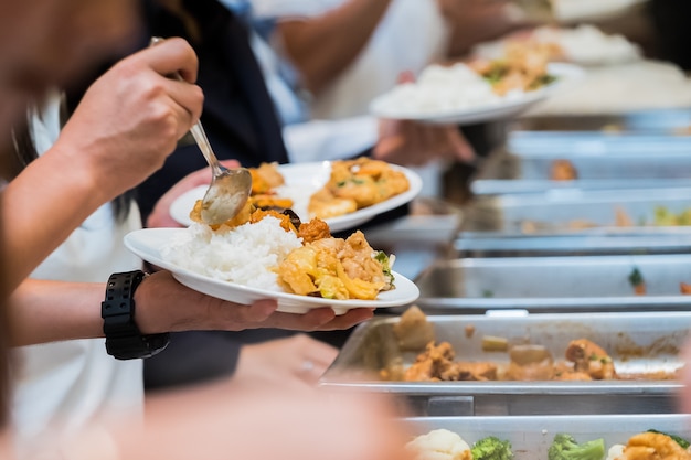 Premium Photo | People group catering buffet food indoor in luxury ...