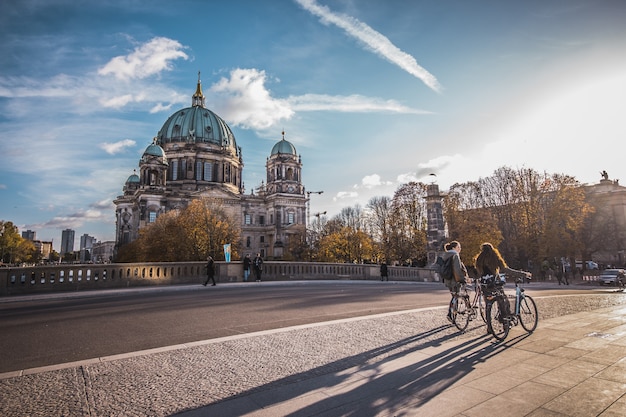People walking and the berlin cathedral in germany. Premium Photo