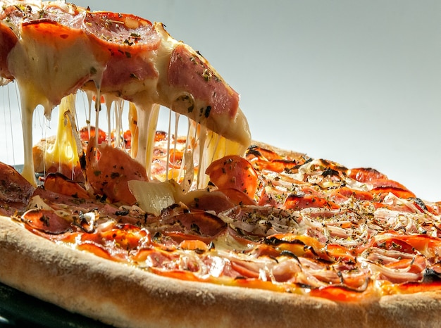 Pepperoni pizza isolated on white Premium Photo
