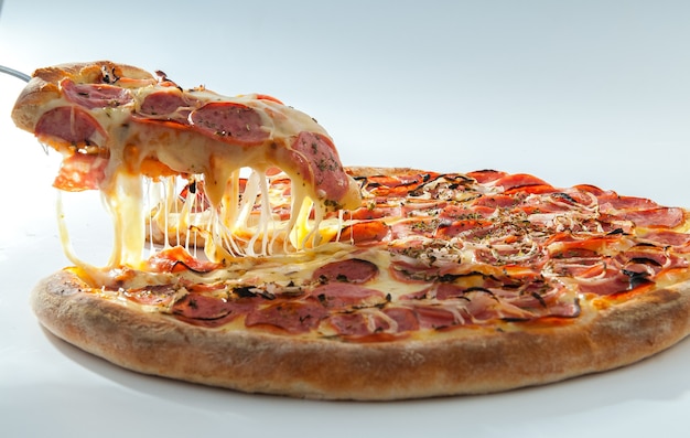Pepperoni pizza isolated on white Premium Photo