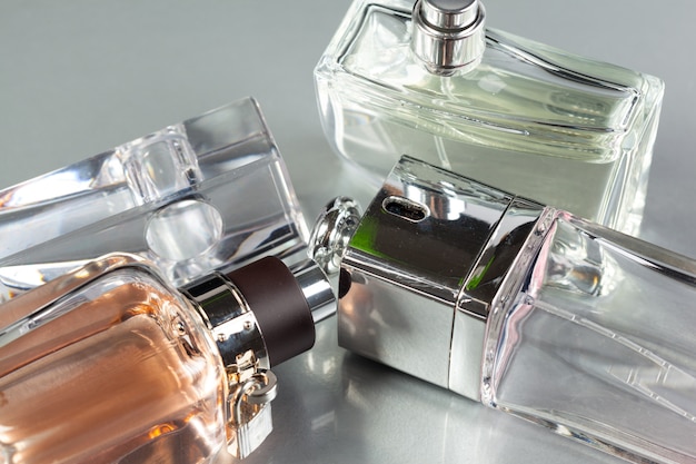 Premium Photo | Perfume bottle on a dark background
