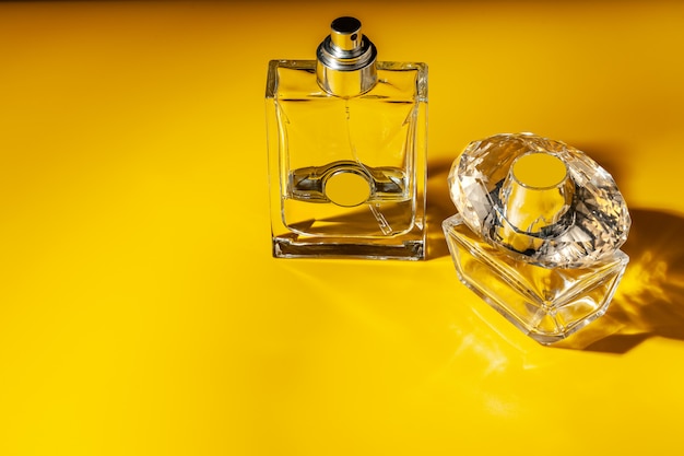 Download Premium Photo Perfume Glass Bottle On Light Yellow Background Eau De Toilette Yellowimages Mockups