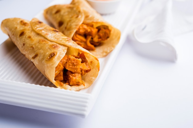 Premium Photo | Peri peri paneer chapati frankie or wrap or roll ...