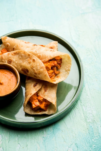 Premium Photo | Peri peri paneer chapati frankie or wrap or roll ...