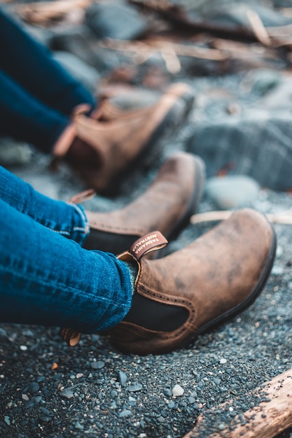 Free Photo | Person in blue denim jeans and brown leather shoes