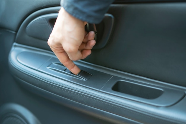 Premium Photo | A person sitting inside the car and open the window ...