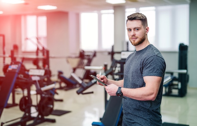 Premium Photo | Personal fitness instructor at the gym