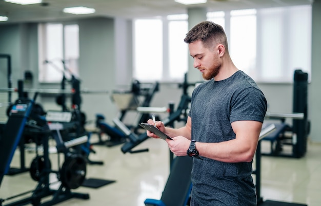 Premium Photo | Personal fitness instructor at the gym