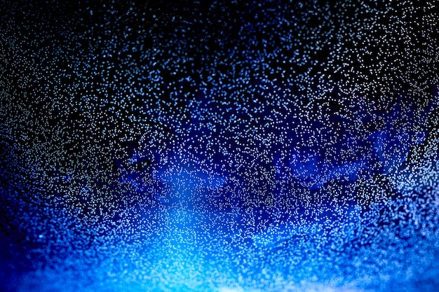 星の抽象的な背景を持つ幻の青い夜空 輝く電球の壁紙 プレミアム写真