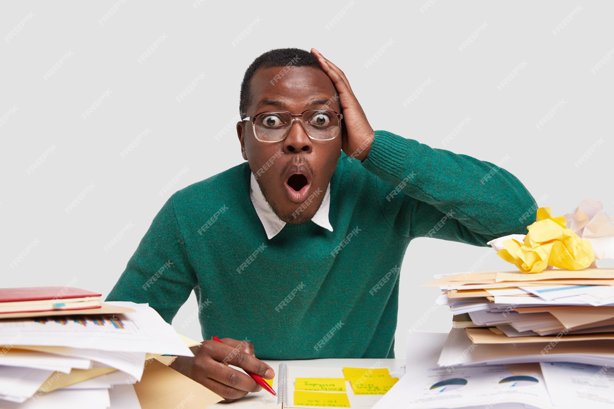 Free Photo | Photo of astonished black man keeps hand on head, jaw ...