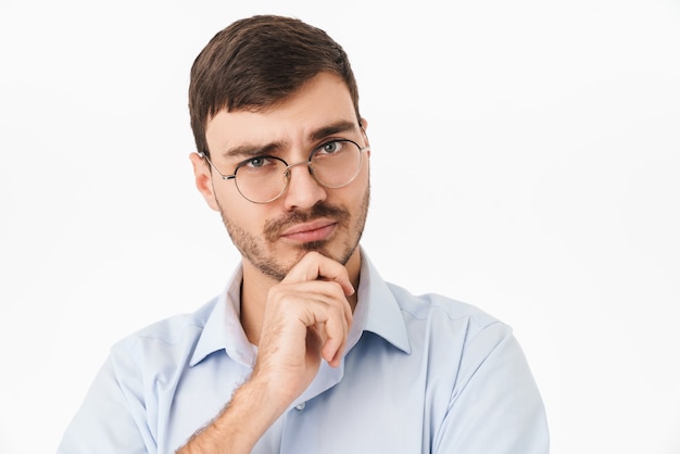 Premium Photo | Photo closeup of thinking young man in eyeglasses ...