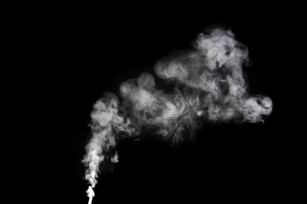 Premium Photo | Photo of developing smoke from a cigarette on a black ...