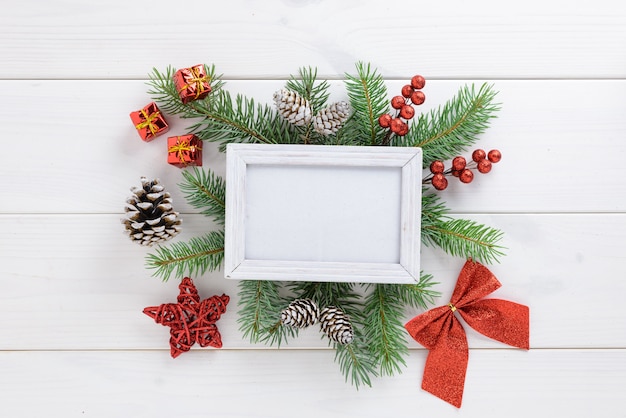 Premium Photo | Photo frame with christmas decoration, with red ribbon ...