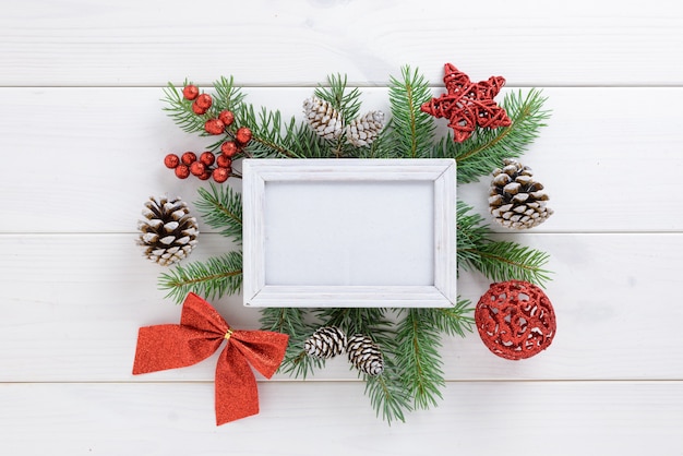 Photo Frame With Christmas Decoration With Red Ribbon Bow And
