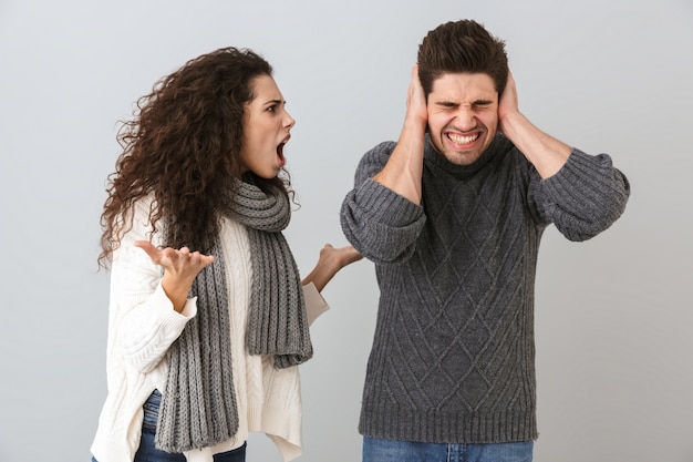 Premium Photo | Photo of irritated man and woman screaming while ...