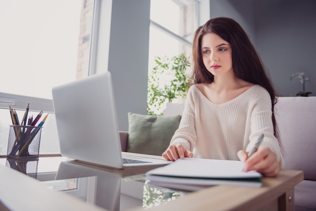 Premium Photo | Photo of young business woman sit dest look computer ...