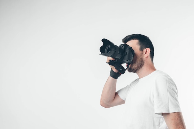 Premium Photo | Photographer isolated over white background taking photos