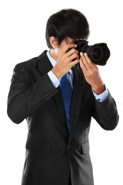 Photographer using dslr camera | Premium Photo