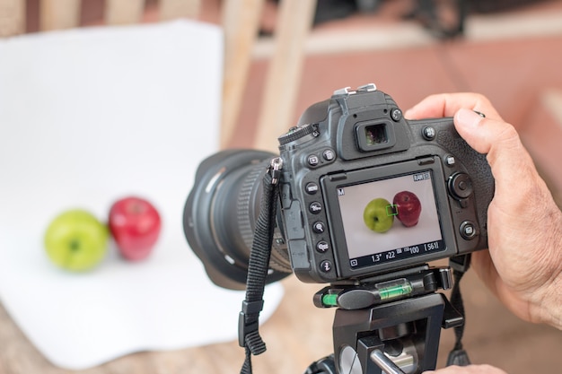 Premium Photo | Photographers are using dslr camera shooting fruit on ...