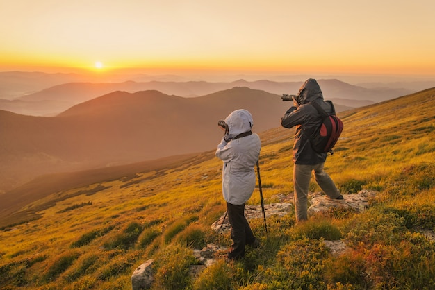 Premium Photo | Photographers takes a sunset in the mountains