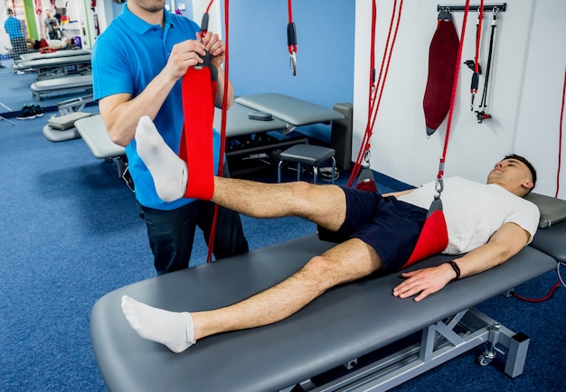 Premium Photo | Physiotherapy. suspension training therapy.