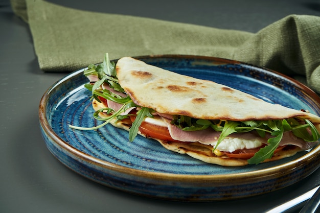 Premium Photo | Piadina - classic italian tortilla-bread with vitello ...