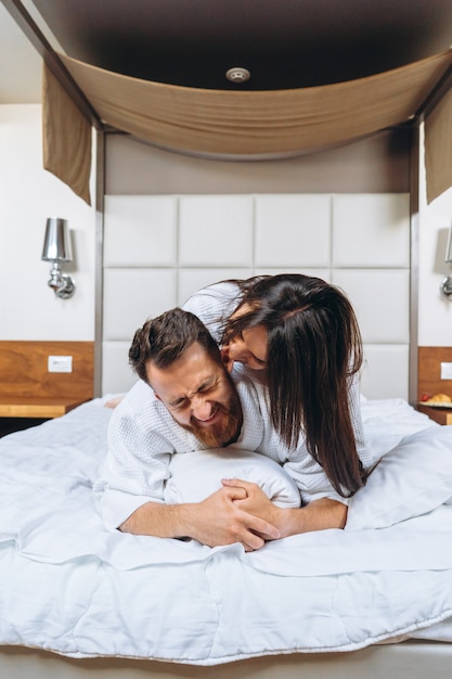 Picture Showing Happy Couple Resting In Hotel Room Photo